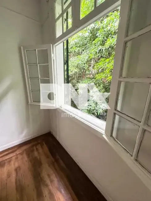 Foto 1 de Apartamento com 3 Quartos à venda, 65m² em Laranjeiras, Rio de Janeiro