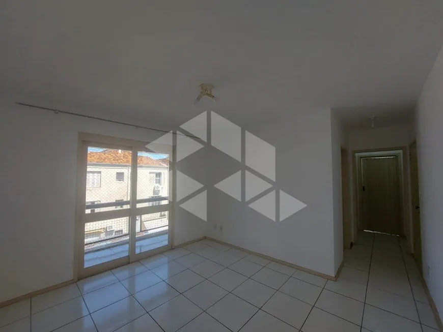 Foto 1 de Apartamento com 1 Quarto para alugar, 38m² em Santo Antônio, Porto Alegre