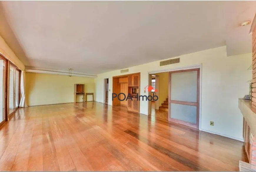 Foto 1 de Casa com 4 Quartos para venda ou aluguel, 342m² em Três Figueiras, Porto Alegre