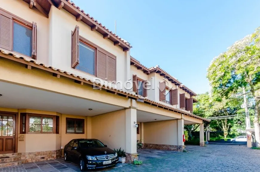 Foto 1 de Casa de Condomínio com 4 Quartos à venda, 313m² em Tristeza, Porto Alegre