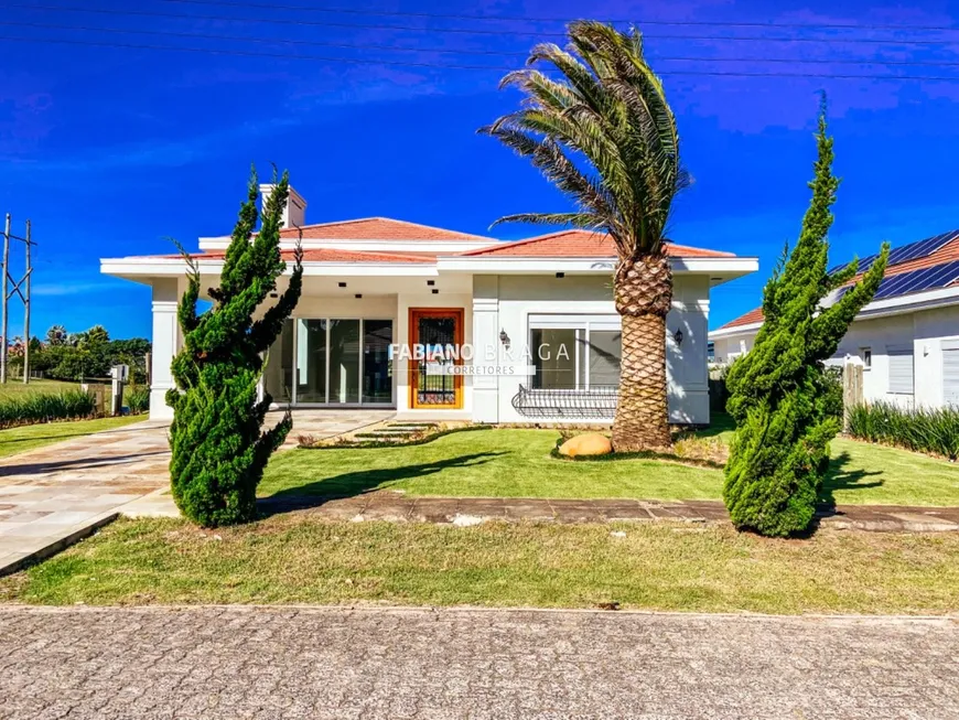 Foto 1 de Casa de Condomínio com 5 Quartos à venda, 360m² em Parque Maristela, Xangri-lá