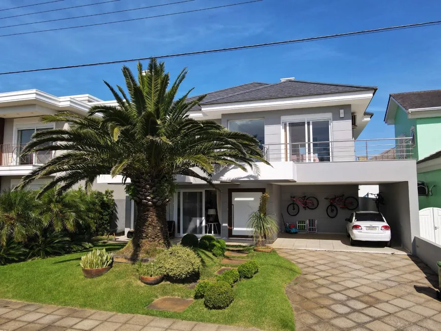 Foto 1 de Casa de Condomínio com 6 Quartos à venda, 450m² em Condominio Condado de Capao, Capão da Canoa