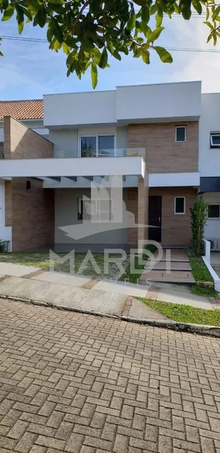 Foto 1 de Casa de Condomínio com 3 Quartos à venda, 197m² em Vila Nova, Porto Alegre