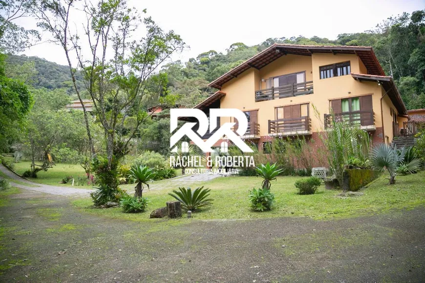 Foto 1 de Casa de Condomínio com 7 Quartos à venda, 530m² em Granja Comary, Teresópolis