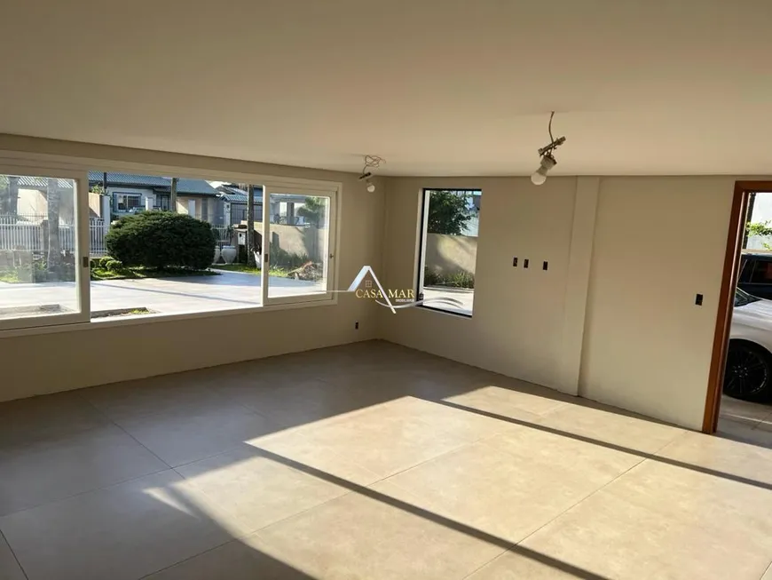 Foto 1 de Casa com 4 Quartos à venda, 260m² em Stan, Torres