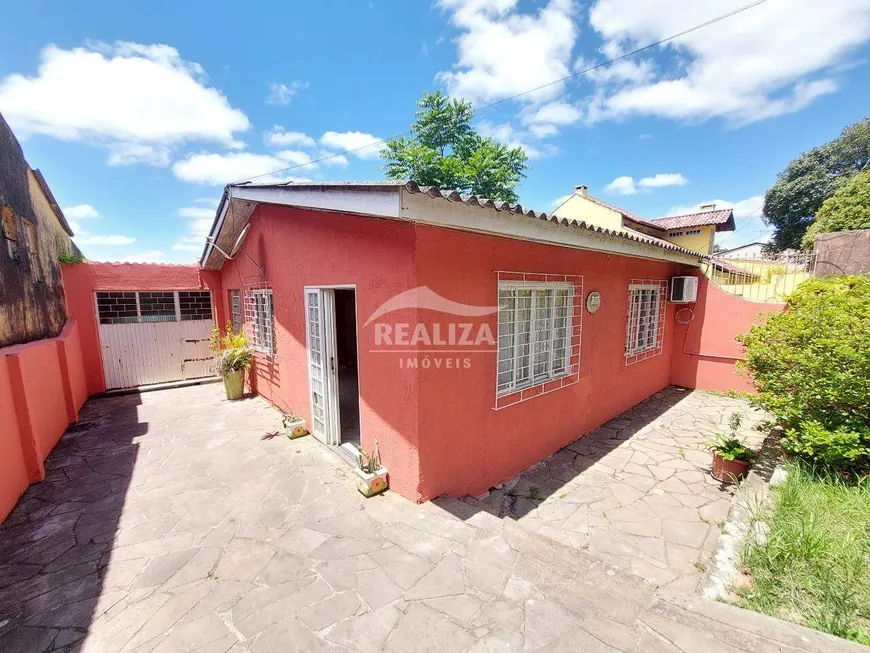 Foto 1 de Casa com 3 Quartos à venda, 65m² em Centro, Viamão