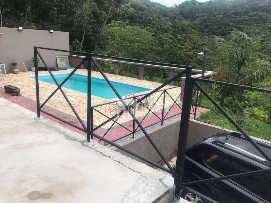 Foto 1 de Casa de Condomínio com 4 Quartos à venda, 240m² em Cantareira, Mairiporã