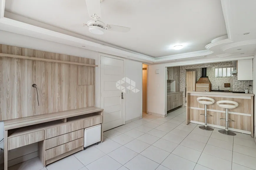 Foto 1 de Casa de Condomínio com 4 Quartos à venda, 85m² em Humaitá, Porto Alegre