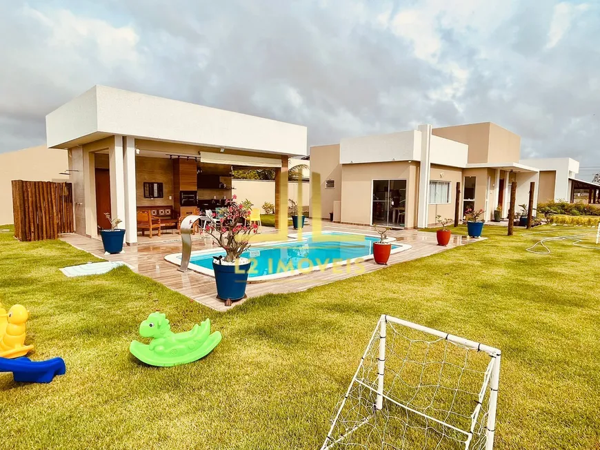 Foto 1 de Casa de Condomínio com 4 Quartos à venda, 160m² em Barra do Jacuípe, Camaçari