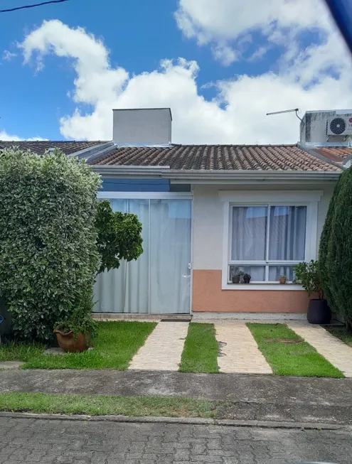 Foto 1 de Casa com 2 Quartos à venda, 55m² em Hípica, Porto Alegre