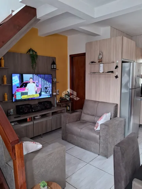 Foto 1 de Casa com 2 Quartos à venda, 60m² em Morada do Vale I, Gravataí