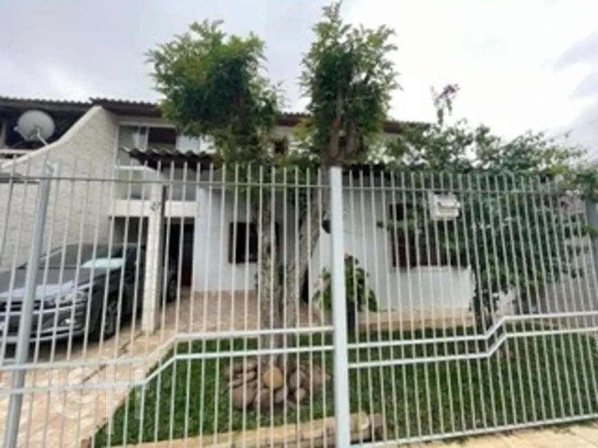 Foto 1 de Casa com 5 Quartos à venda, 200m² em Guajuviras, Canoas