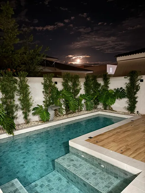 Foto 1 de Casa de Condomínio com 4 Quartos à venda, 381m² em Jardins Valencia, Goiânia