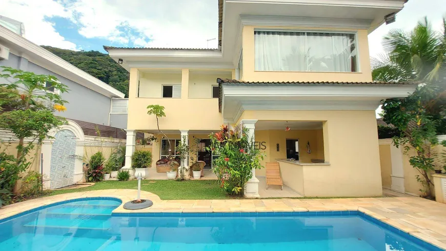 Foto 1 de Casa de Condomínio com 4 Quartos para venda ou aluguel, 300m² em Balneário Praia do Pernambuco, Guarujá
