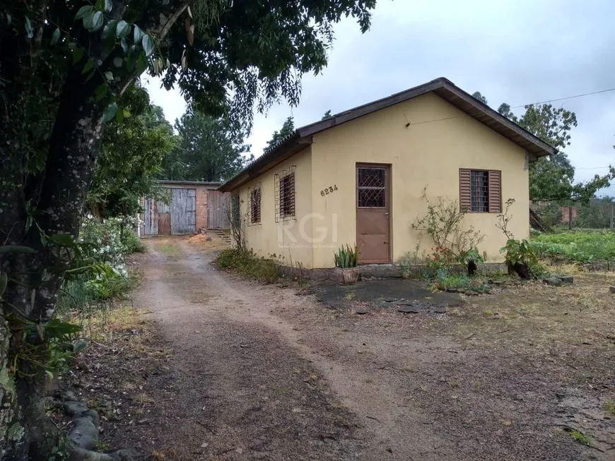 Foto 1 de Casa com 2 Quartos à venda, 74m² em Hípica, Porto Alegre