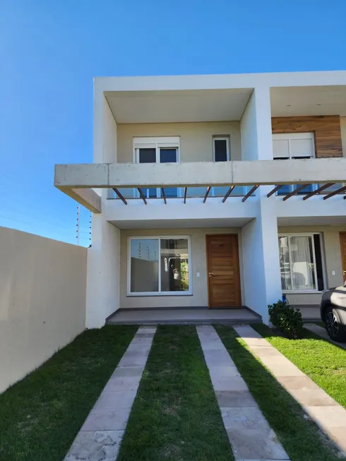 Foto 1 de Casa de Condomínio com 2 Quartos à venda, 112m² em Zona Nova, Capão da Canoa
