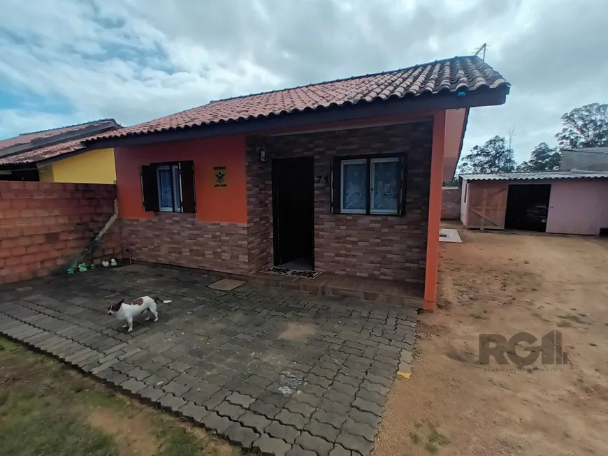 Foto 1 de Casa com 2 Quartos à venda, 53m² em Fiuza, Viamão