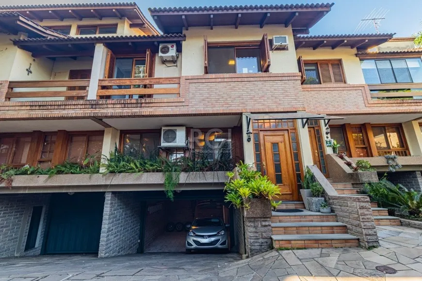 Foto 1 de Casa de Condomínio com 4 Quartos à venda, 247m² em Tristeza, Porto Alegre