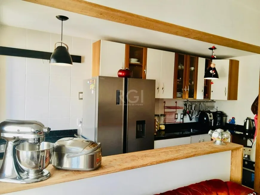 Foto 1 de Apartamento com 3 Quartos à venda, 66m² em Santo Antônio, Porto Alegre