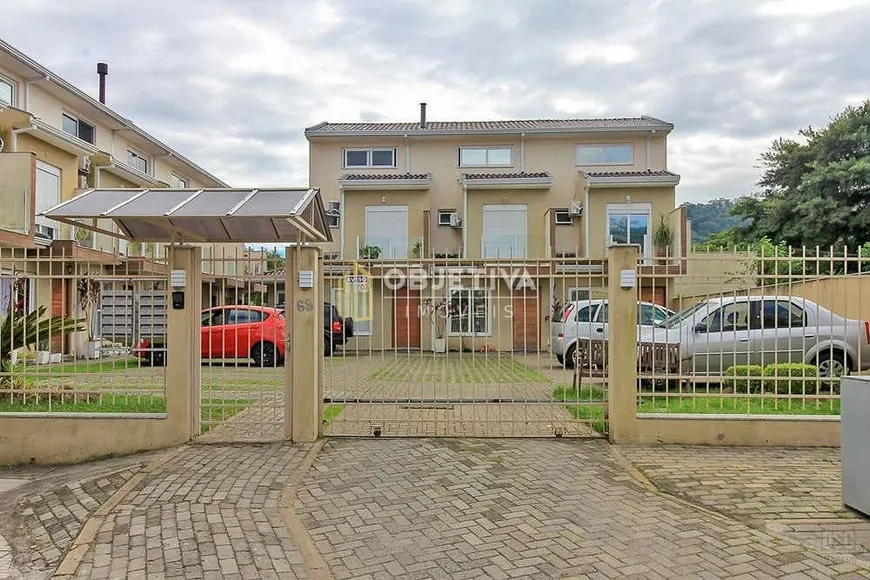 Foto 1 de Casa de Condomínio com 2 Quartos à venda, 93m² em Vila Nova, Porto Alegre