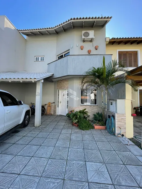 Foto 1 de Casa de Condomínio com 3 Quartos à venda, 140m² em Passo das Pedras, Porto Alegre