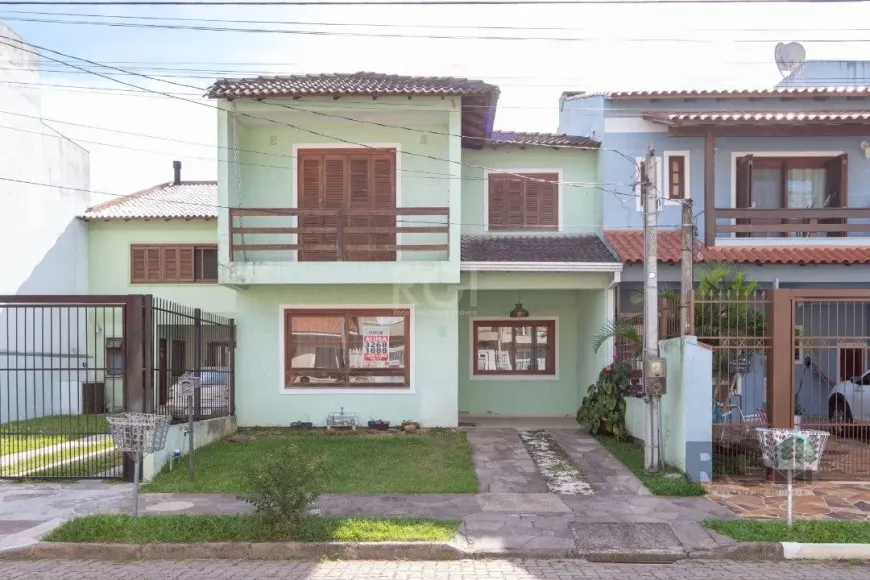 Foto 1 de Casa com 4 Quartos à venda, 151m² em Hípica, Porto Alegre