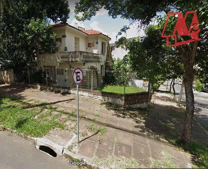 Foto 1 de Sobrado com 4 Quartos à venda, 240m² em Rio Branco, Porto Alegre