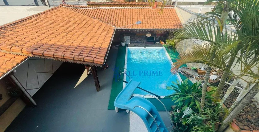 Foto 1 de Sobrado com 5 Quartos à venda, 300m² em Canto do Forte, Praia Grande