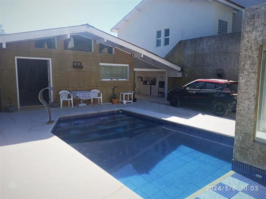 Foto 1 de Casa com 5 Quartos à venda, 300m² em Jardim Guaiúba, Guarujá