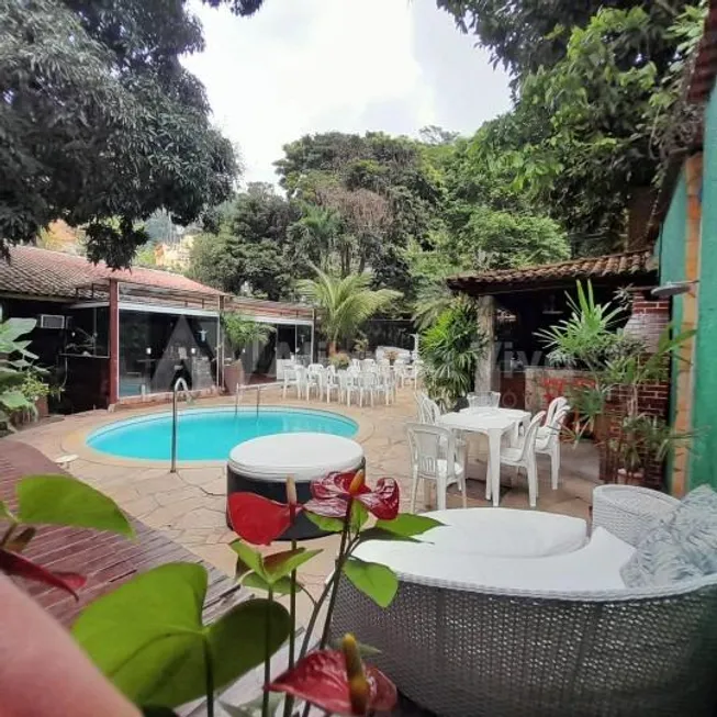 Foto 1 de Casa com 5 Quartos à venda, 480m² em Cosme Velho, Rio de Janeiro