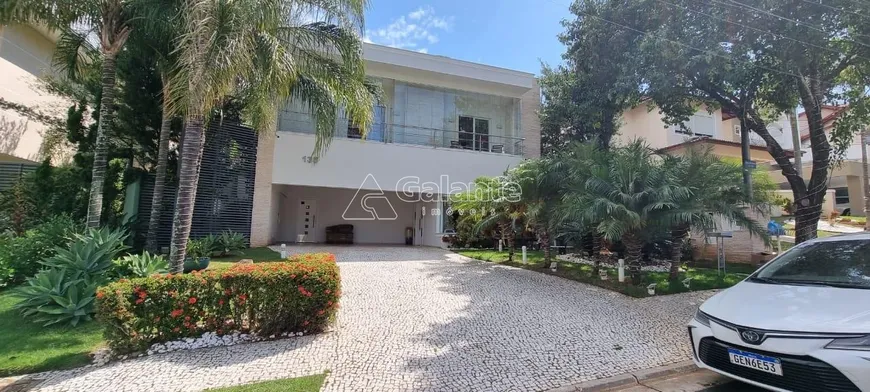 Foto 1 de Casa de Condomínio com 4 Quartos para venda ou aluguel, 400m² em Loteamento Alphaville Campinas, Campinas