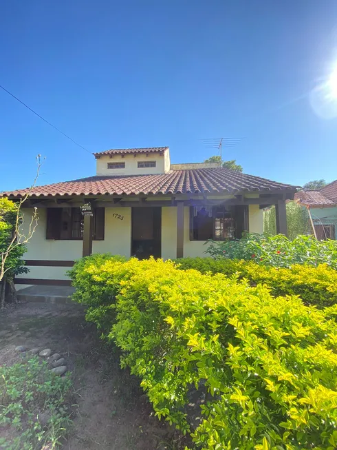 Foto 1 de Casa com 2 Quartos à venda, 189m² em Vila Nova, Porto Alegre