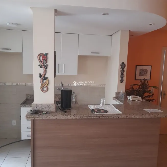 Foto 1 de Apartamento com 2 Quartos à venda, 55m² em Guarujá, Porto Alegre