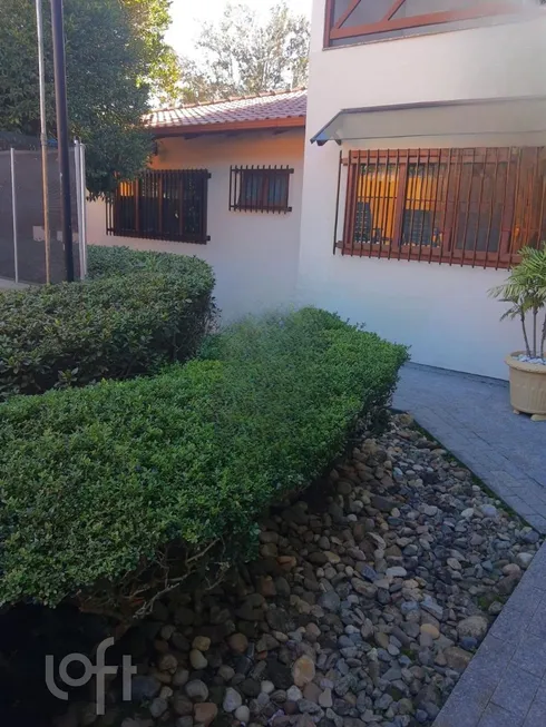 Foto 1 de Casa com 5 Quartos à venda, 600m² em Itacorubi, Florianópolis