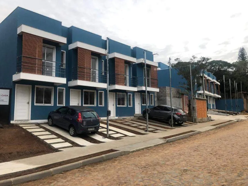 Foto 1 de Casa com 2 Quartos à venda, 54m² em Tarumã, Viamão