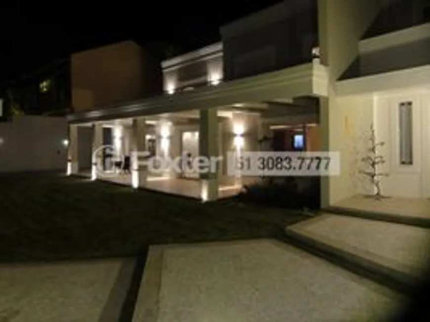 Foto 1 de Casa com 4 Quartos à venda, 570m² em Três Figueiras, Porto Alegre
