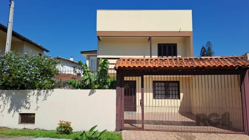 Foto 1 de Casa com 2 Quartos à venda, 149m² em Espiríto Santo, Porto Alegre