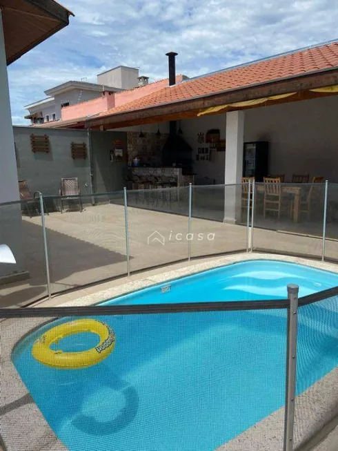 Foto 1 de Casa com 2 Quartos à venda, 70m² em Village das Flores, Caçapava