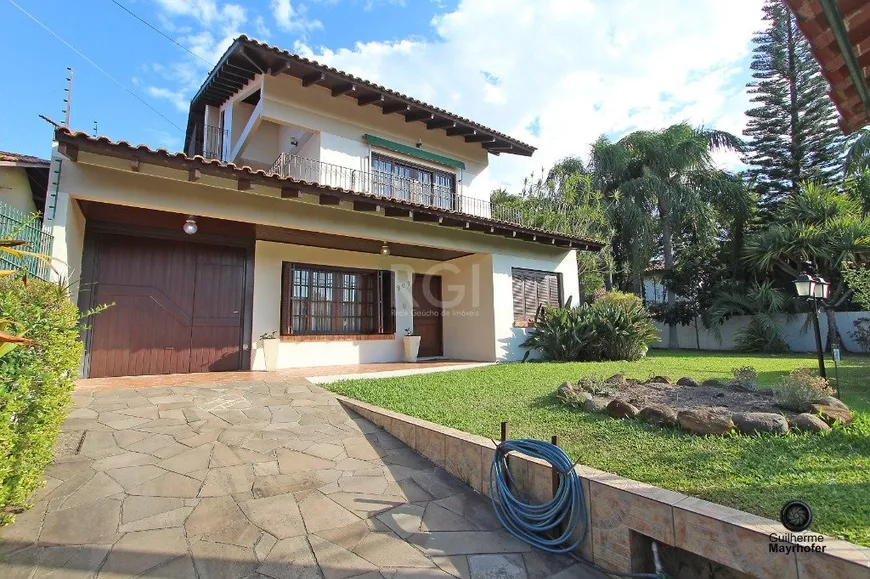 Foto 1 de Casa com 4 Quartos à venda, 294m² em Ipanema, Porto Alegre