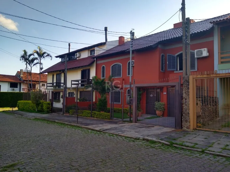Foto 1 de Casa com 4 Quartos à venda, 268m² em Guarujá, Porto Alegre