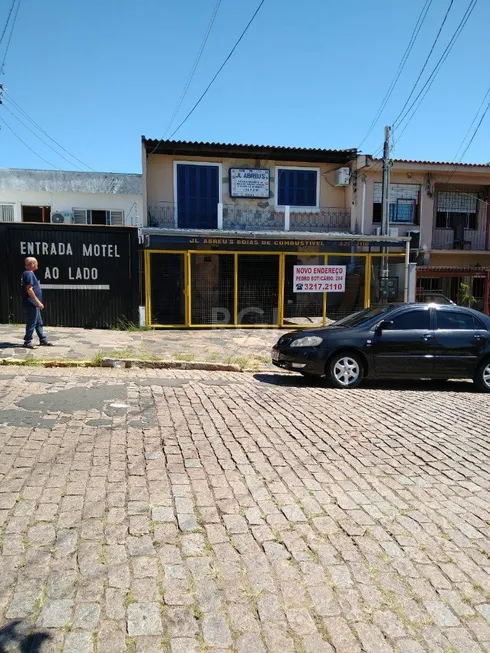 Foto 1 de Casa com 5 Quartos à venda, 75m² em Santo Antônio, Porto Alegre