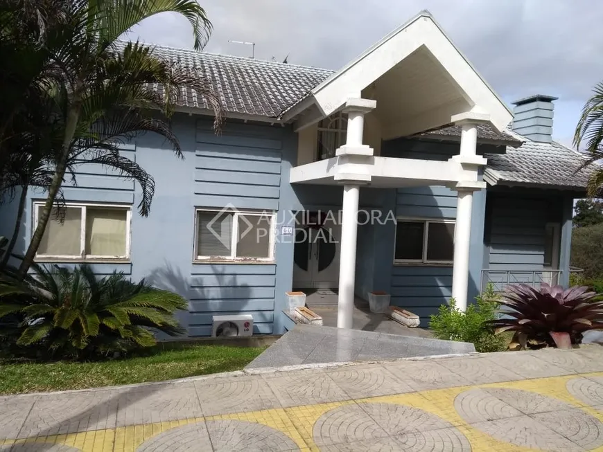 Foto 1 de Casa de Condomínio com 4 Quartos à venda, 620m² em Altos da Alegria, Guaíba