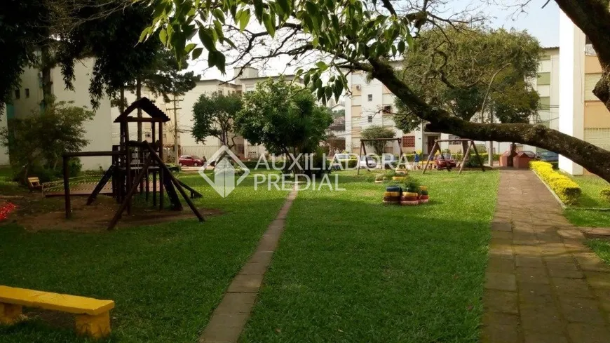Foto 1 de Apartamento com 2 Quartos à venda, 49m² em Santo Antônio, Porto Alegre