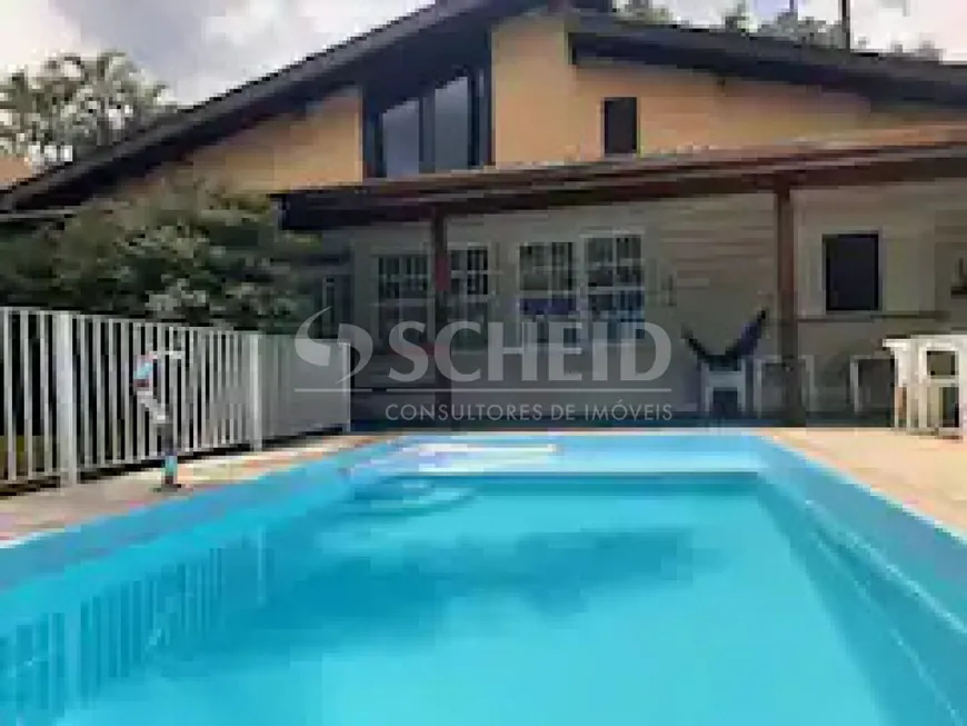 Foto 1 de Casa com 6 Quartos à venda, 497m² em Praia do Leblon, São Paulo