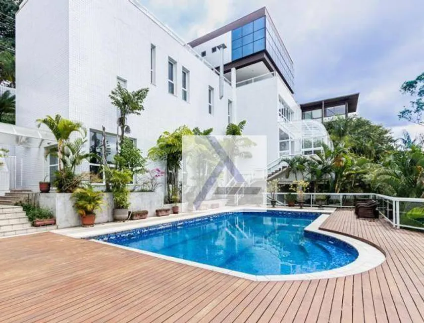 Foto 1 de Casa de Condomínio com 6 Quartos à venda, 1430m² em Jardim Vitoria Regia, São Paulo