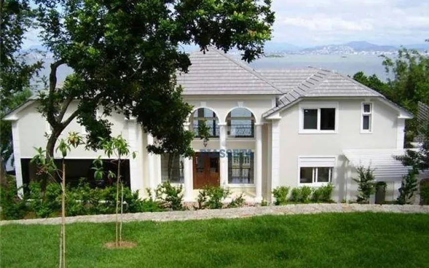 Foto 1 de Casa com 6 Quartos à venda, 1200m² em Cacupé, Florianópolis