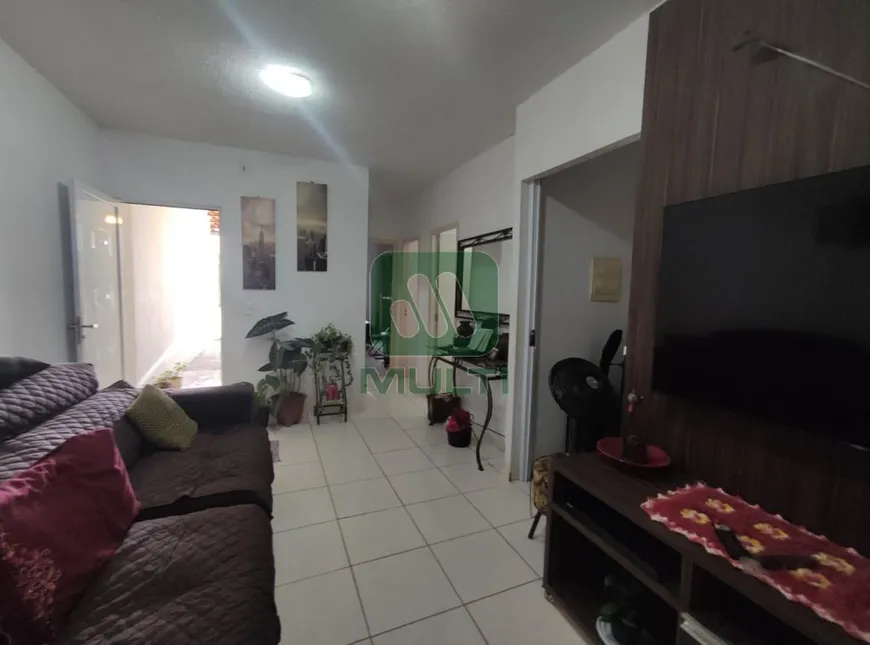 Foto 1 de Casa de Condomínio com 4 Quartos à venda, 100m² em Daniel Fonseca, Uberlândia