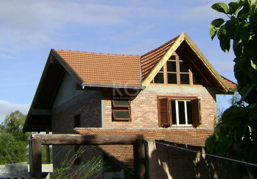 Foto 1 de Casa com 3 Quartos à venda, 132m² em Hípica, Porto Alegre