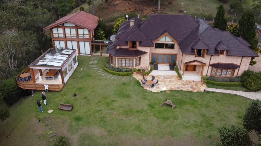 Foto 1 de Casa de Condomínio com 6 Quartos à venda, 1400m² em Centro, Campos do Jordão