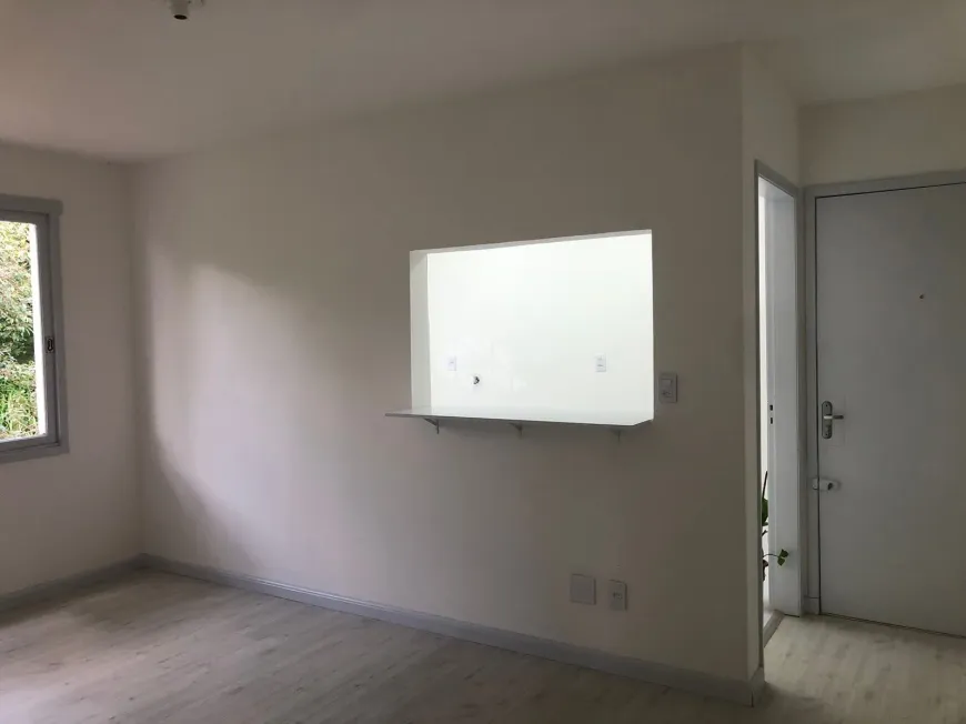 Foto 1 de Apartamento com 1 Quarto à venda, 46m² em Santo Antônio, Porto Alegre